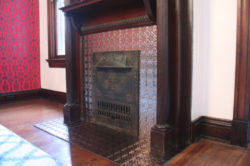 Fireplace gets new life with Fasade Tiles