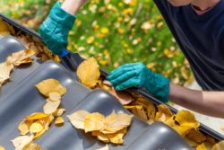 Cleaning gutters get your home ready for winter