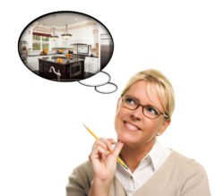 woman thinking of new kitchen