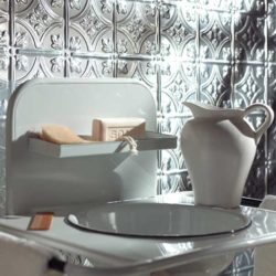 bathroom sink with Fasade backsplash